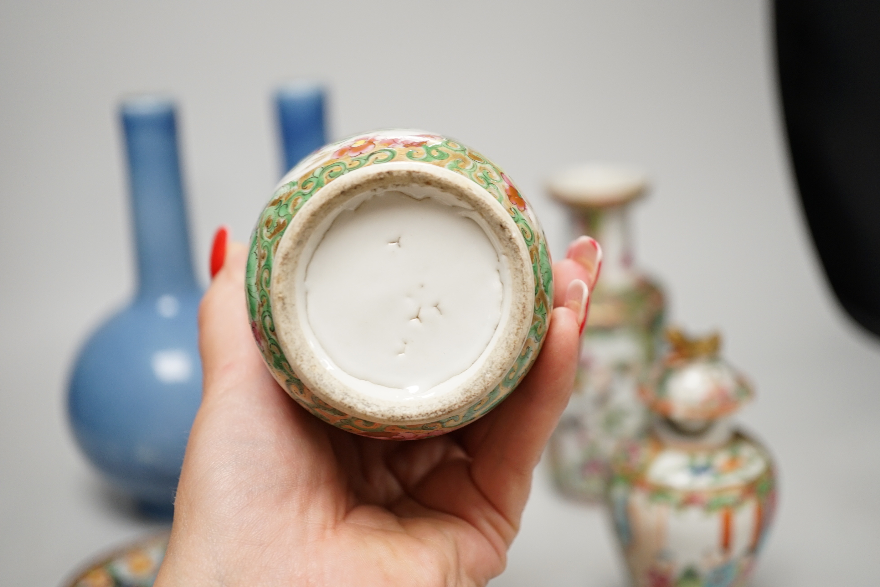 Chinese ceramics including a pair of Canton vases, baluster jar and cover and enamelled matchbox holder, the largest 24cm high